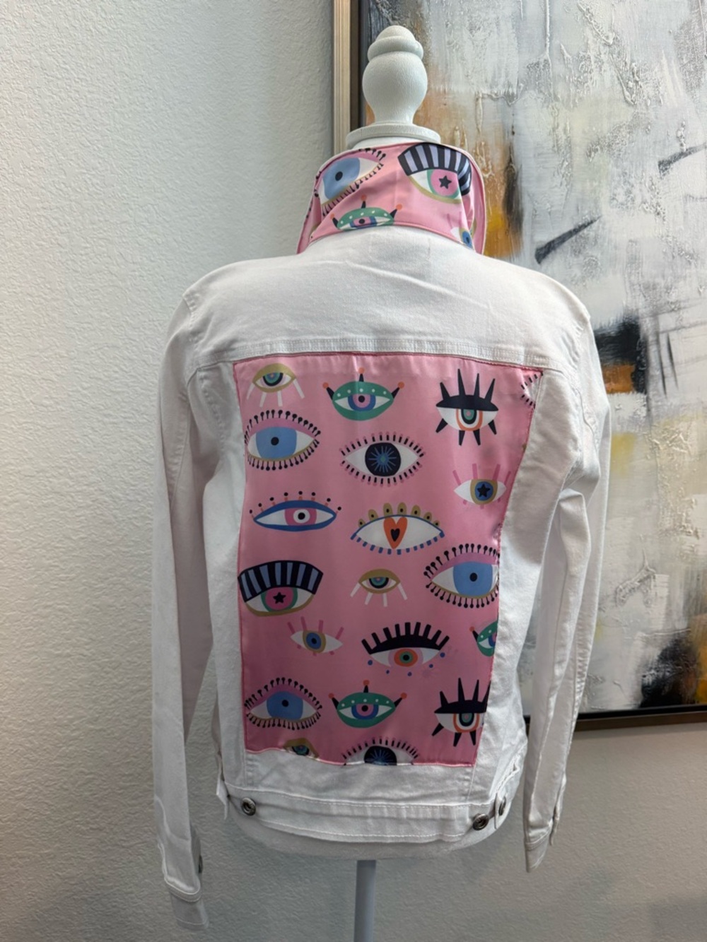 White Distressed Jean Jacket with Pink Eye-Print Scarf Back Panel